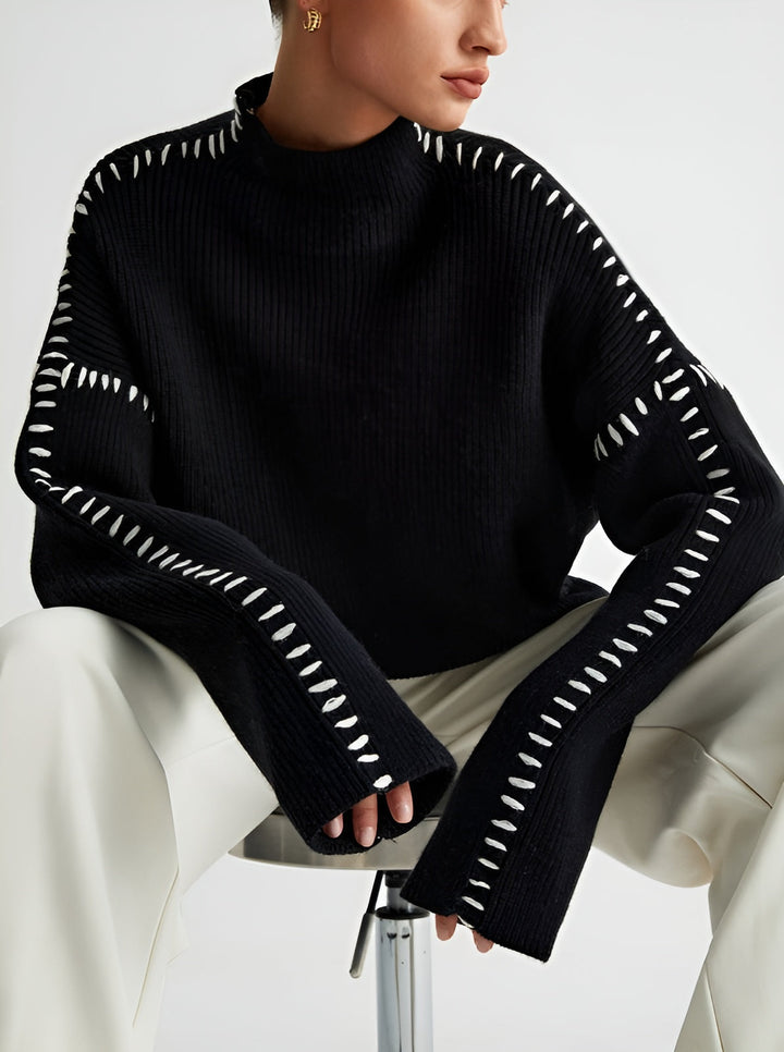 Knitted jumper with stitched details