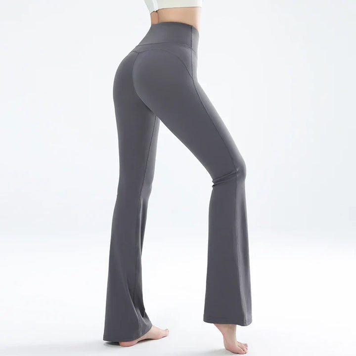 Wide elastic high-waisted trousers