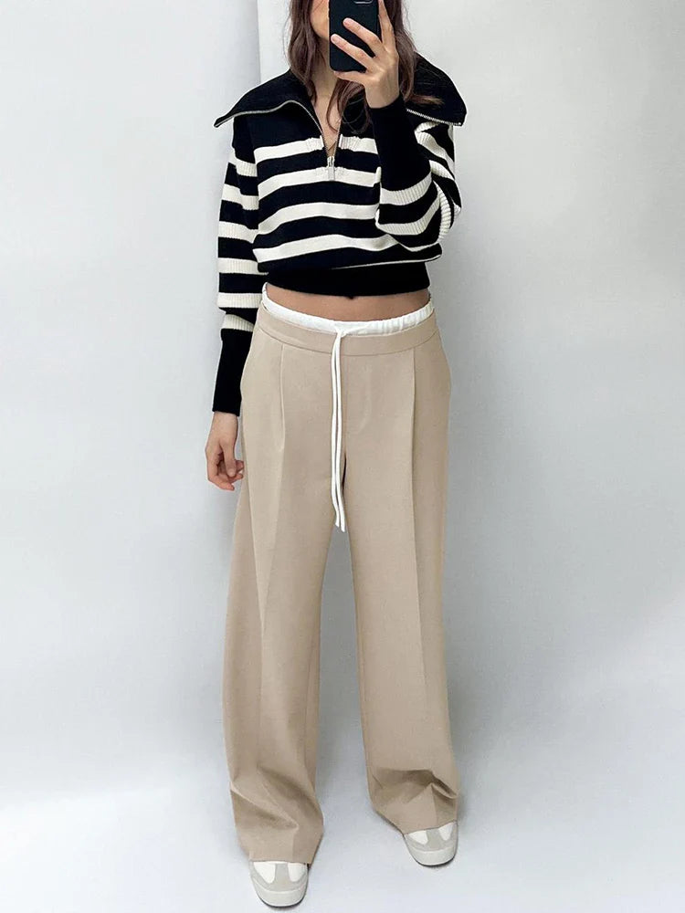 Wide trousers with double waistband