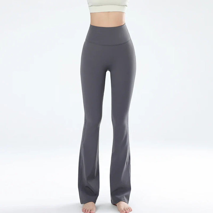 Wide elastic high-waisted trousers