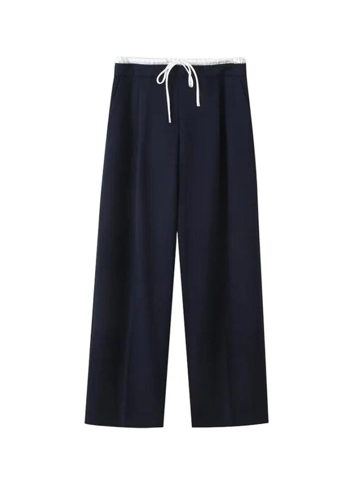 Wide trousers with double waistband