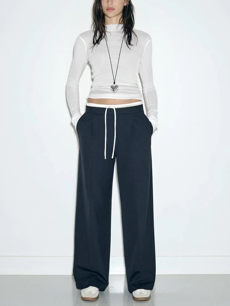 Wide trousers with double waistband