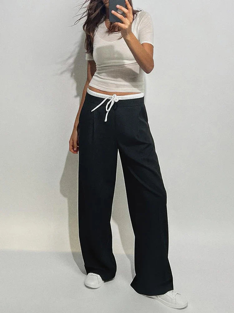 Wide trousers with double waistband